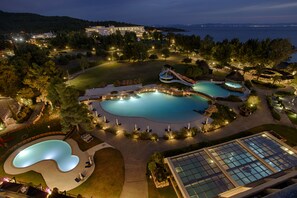 Indoor pool, outdoor pool, pool umbrellas, pool loungers