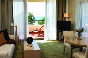 Standard Room | Living area | Flat-screen TV - Sithonia - Porto Carras Grand Resort (Sithonia)