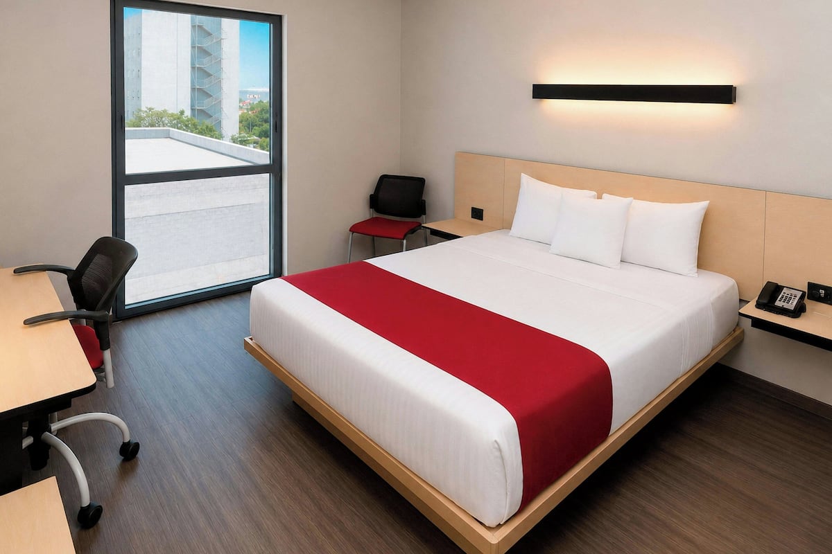 Room, 1 Queen Bed | Desk, blackout drapes, iron/ironing board, WiFi (free)