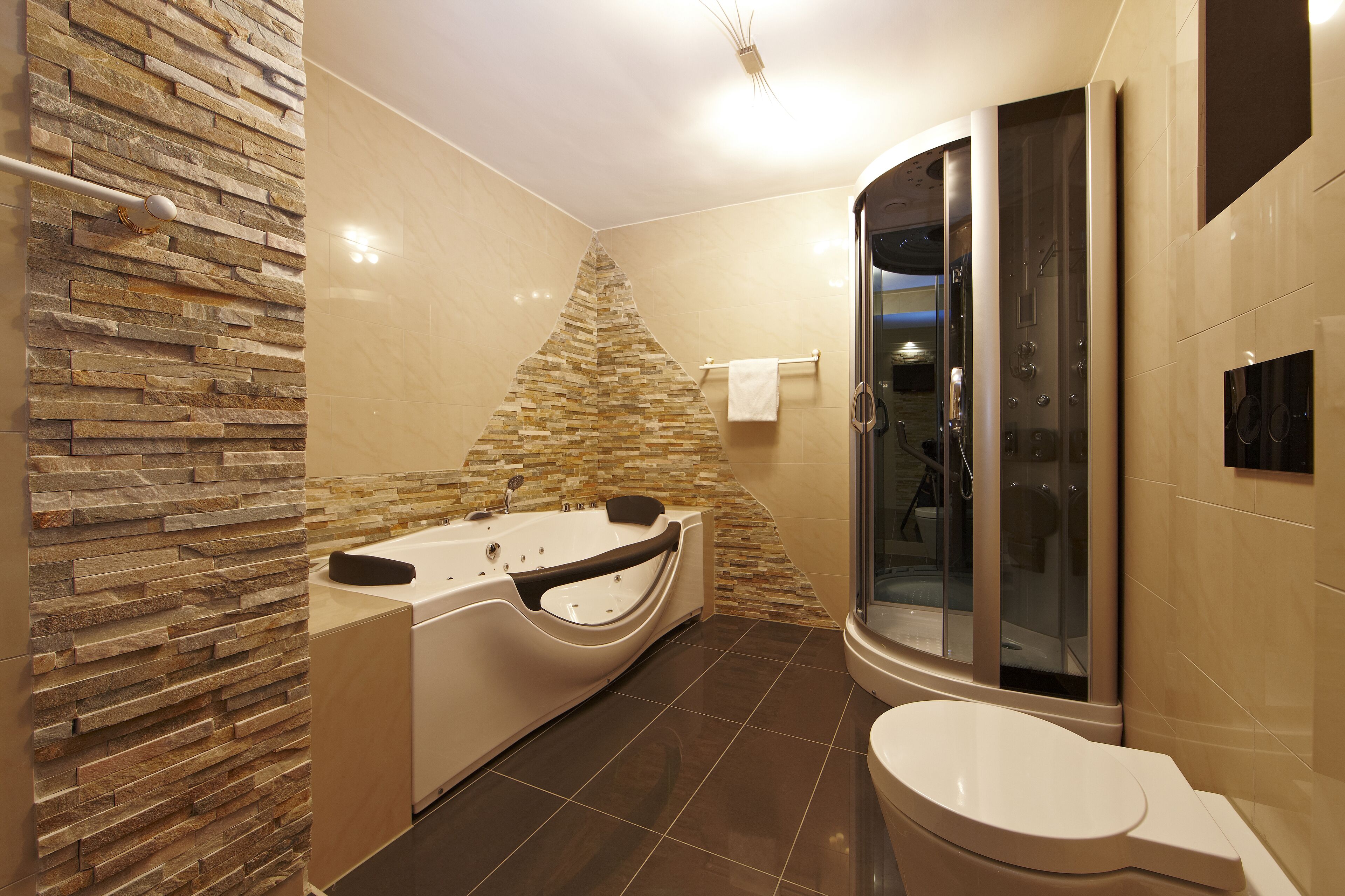 junior suite | bathroom | hair dryer, bathrobes, slippers, towels