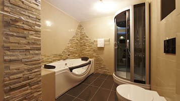 Junior Suite | Bathroom | Hair dryer, bathrobes, slippers, towels