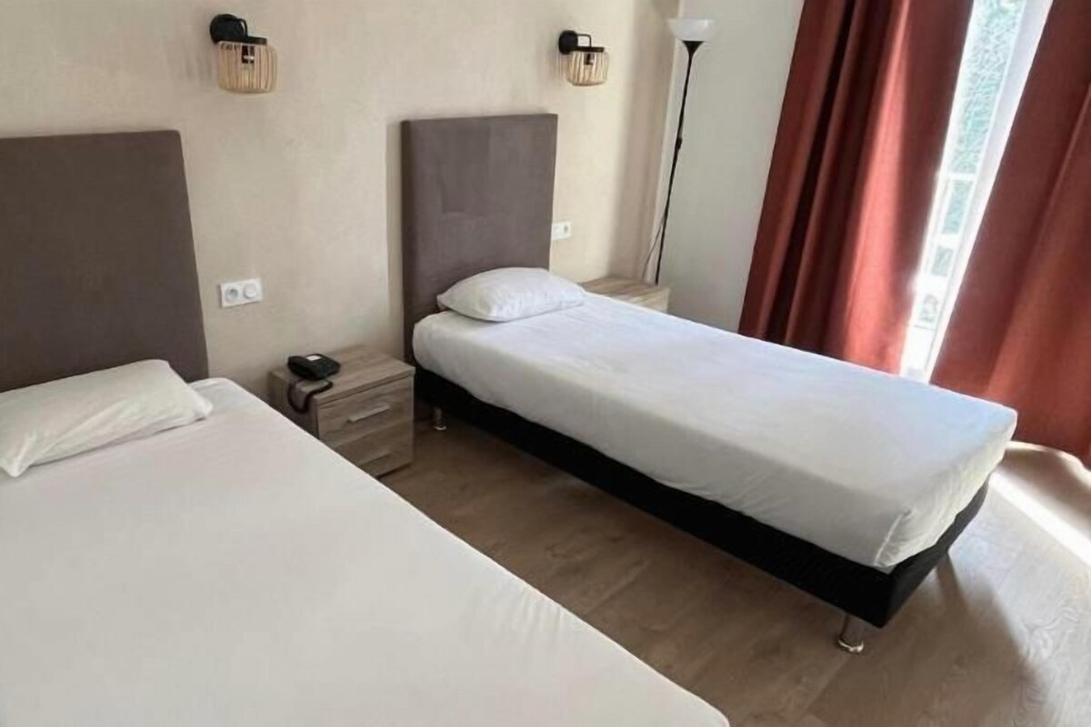 Desk, soundproofing, rollaway beds (surcharge), WiFi (free)