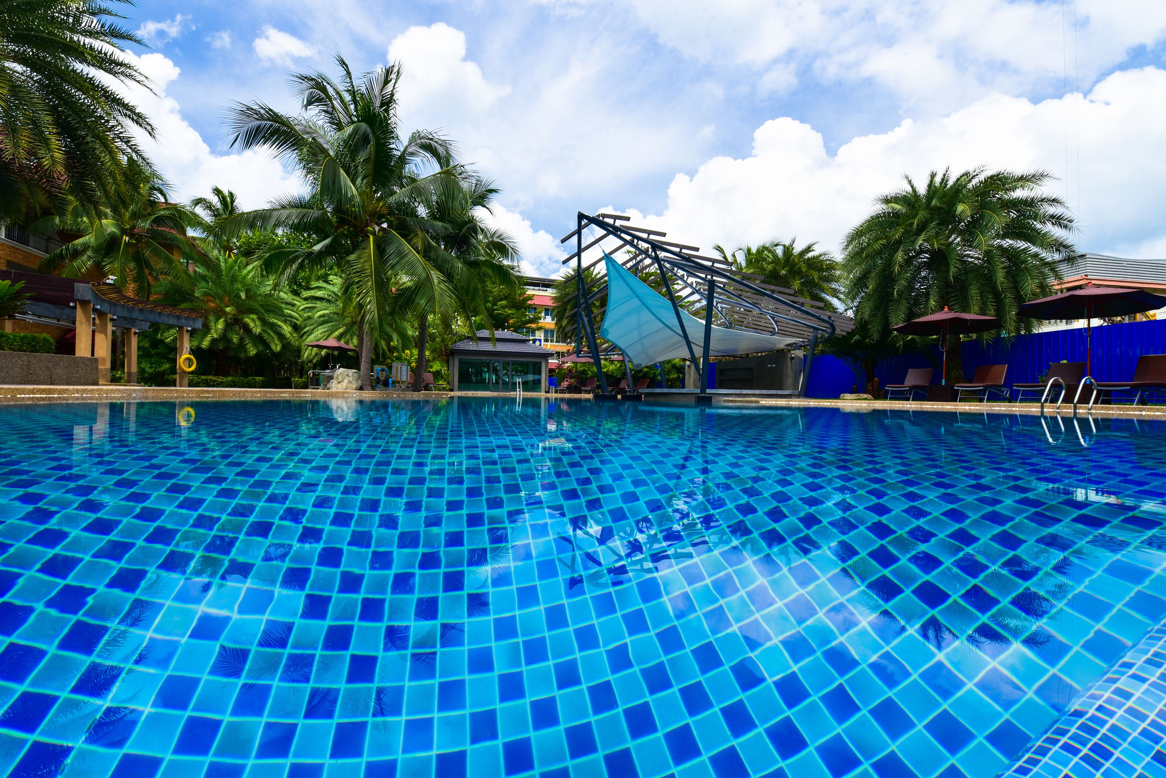 outdoor pool, pool umbrellas, pool loungers