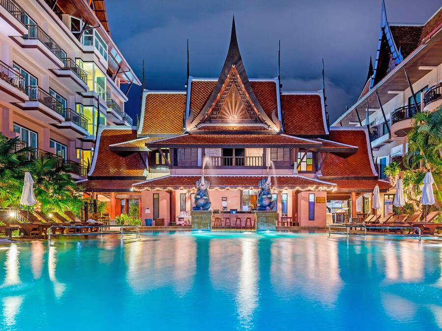 Outdoor pool, open 10:00 AM to 9:00 PM, pool umbrellas