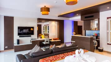 Nipa Grand Suite Room | Living area | 43-inch LED TV with cable channels, TV