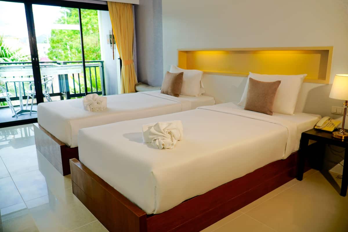Deluxe Room | Minibar, in-room safe, blackout curtains, free cots/infant beds