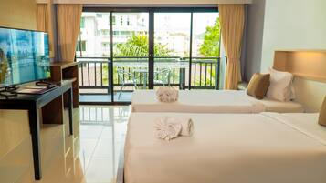 Deluxe Room | Minibar, in-room safe, blackout curtains, free cots/infant beds