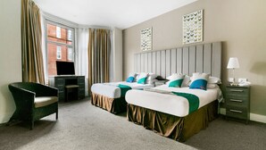 Standard Quadruple Room, 2 Double Beds | WiFi (free), bed sheets - OYO The Ivory Hotel (Glasgow)