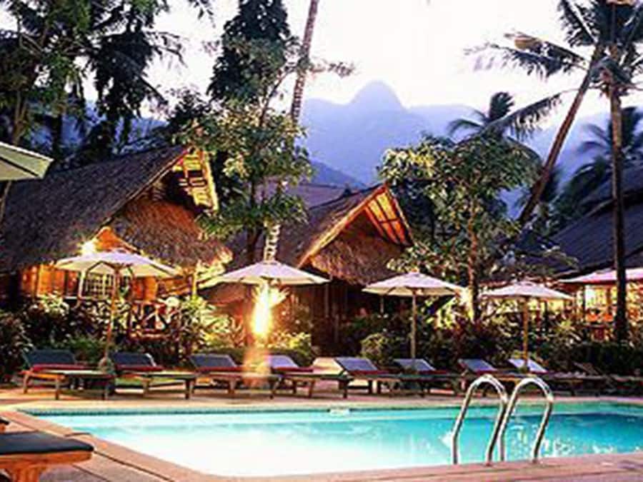 Indoor pool, outdoor pool, pool umbrellas, sun loungers