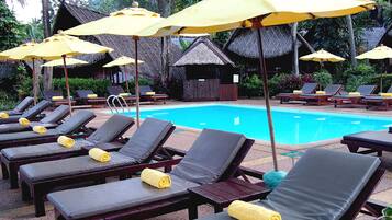 Indoor pool, outdoor pool, pool umbrellas, pool loungers