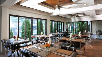 Breakfast, lunch, dinner served; Thai cuisine, alfresco dining