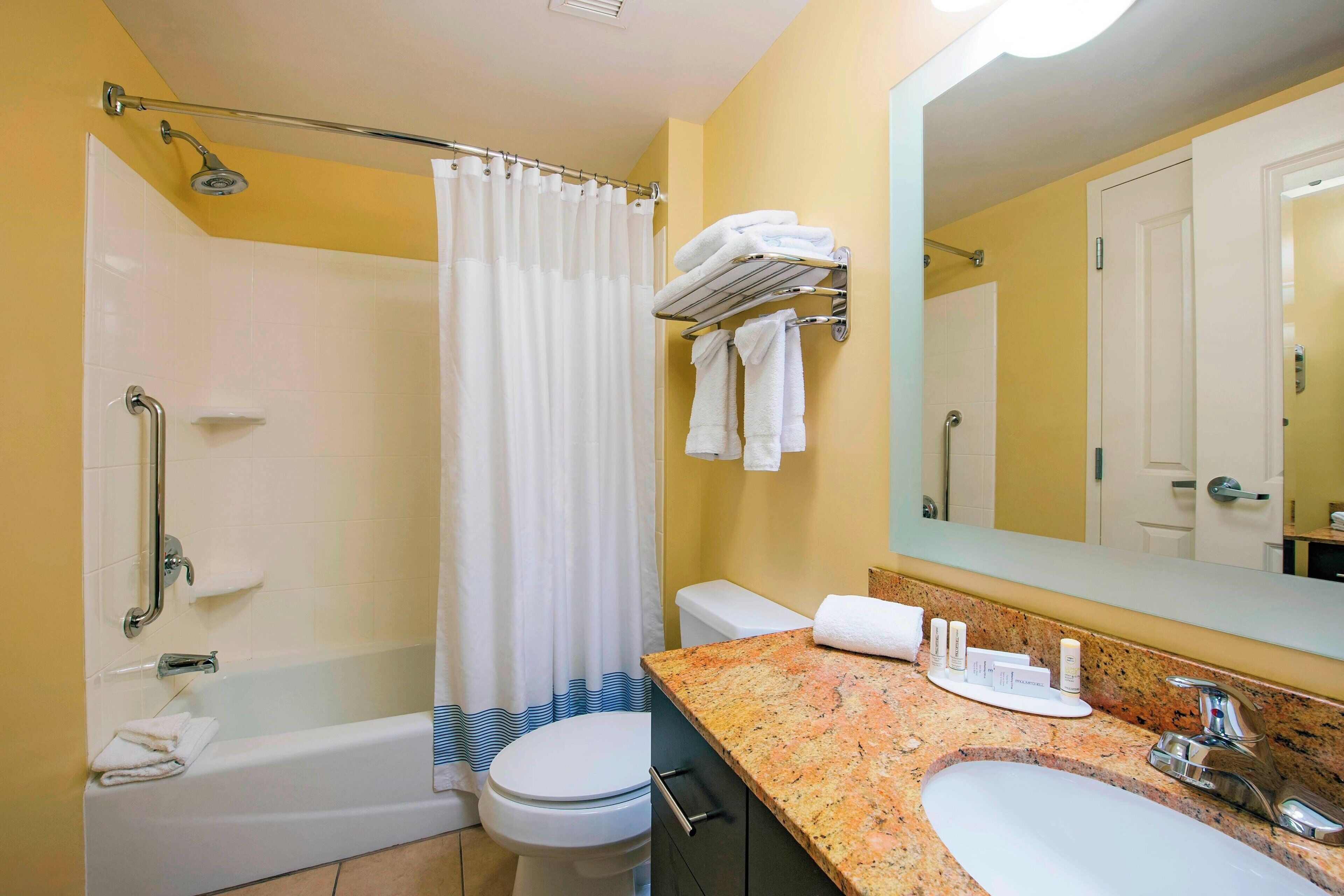 combined shower/bathtub, free toiletries, hair dryer, towels
