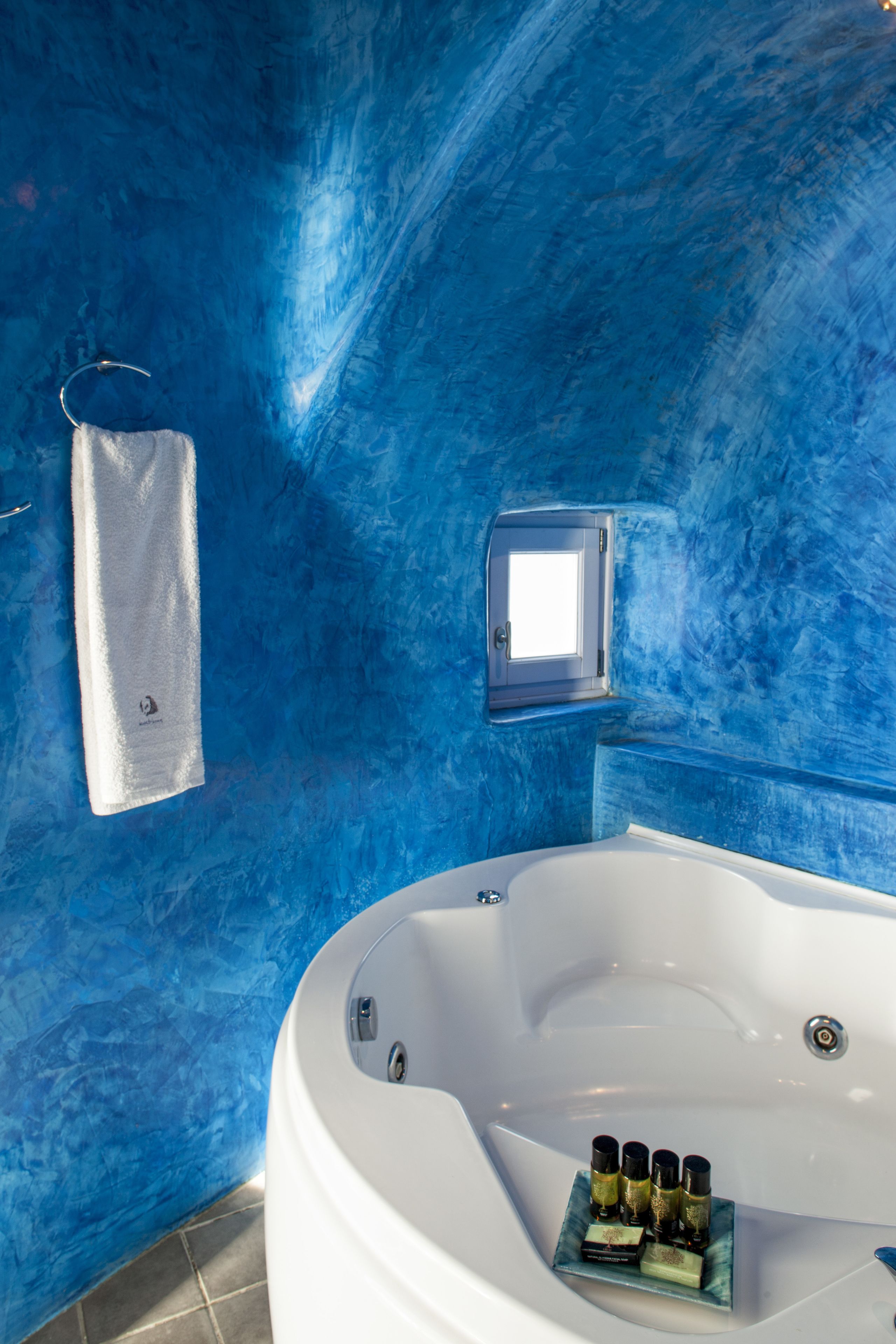 suite (ostria) | bathroom amenities | free toiletries, hair dryer, bathrobes, slippers