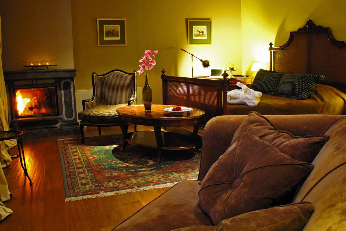 junior suite, fireplace | premium bedding, minibar, in-room safe, desk