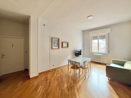 Classic Apartment, 2 Bedrooms, Kitchen | Living area | 32-inch flat-screen TV with digital channels, TV