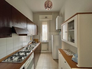 Classic Apartment, 2 Bedrooms, Kitchen | Private kitchen | Fridge, paper towels - Santo Spirito (Arezzo)