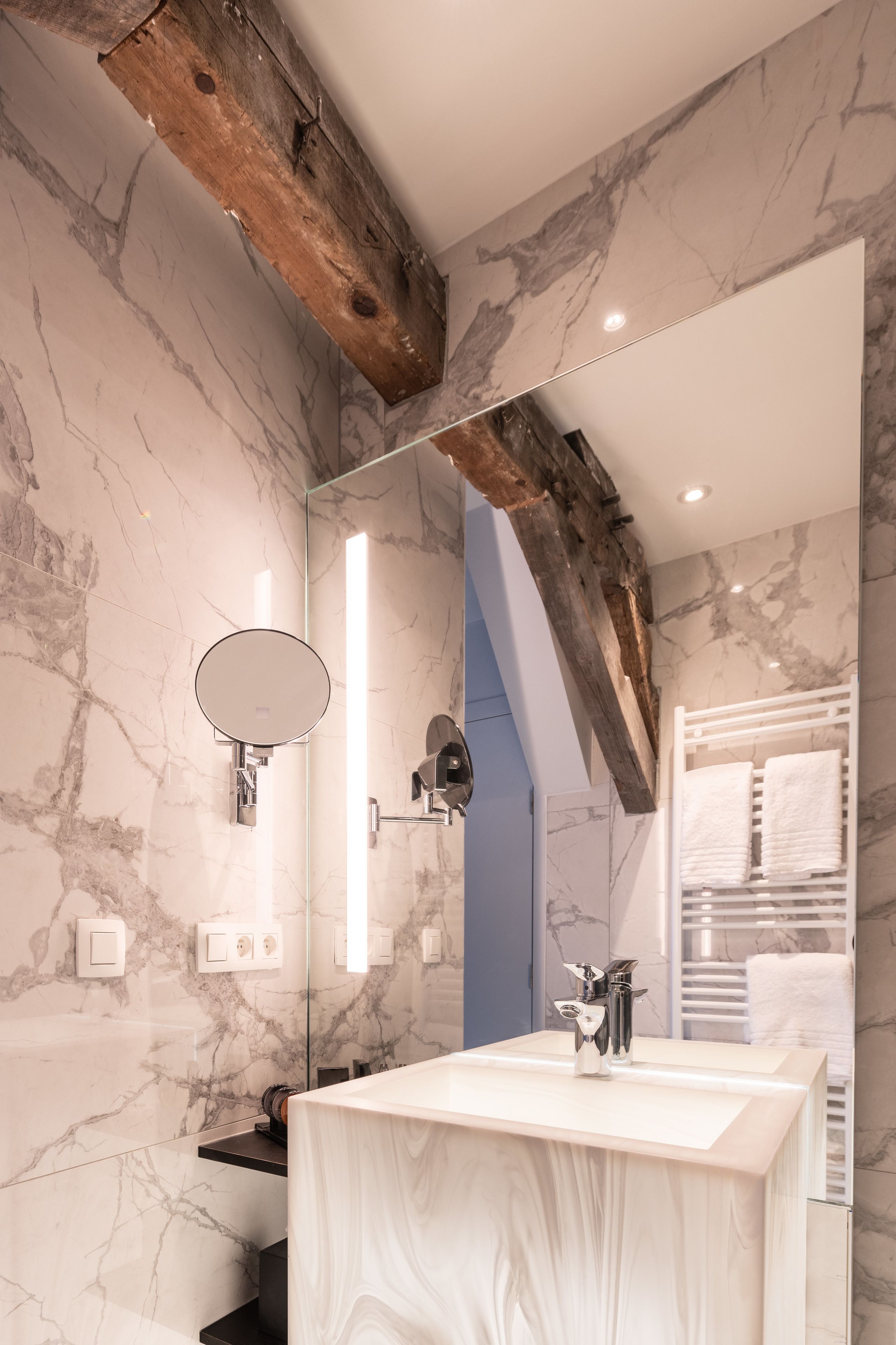 the verlaine suite | bathroom | rainfall showerhead, free toiletries, hair dryer, towels