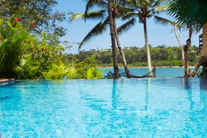 Outdoor pool, pool umbrellas, sun loungers
