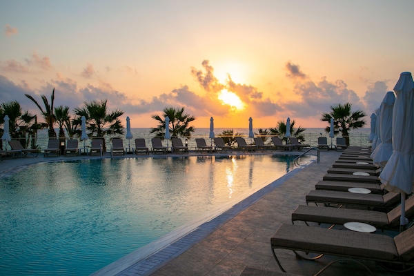 Indoor pool, 2 outdoor pools, open 10:00 AM to 6:30 PM, pool umbrellas