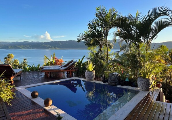 Deluxe Room, Poolside | Terrace/patio