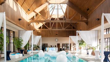 Indoor pool, open 7:00 AM to 11:00 PM, pool loungers