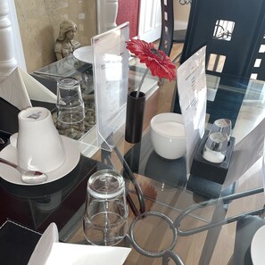 Tableware and home goods on display in a stylish dining area.