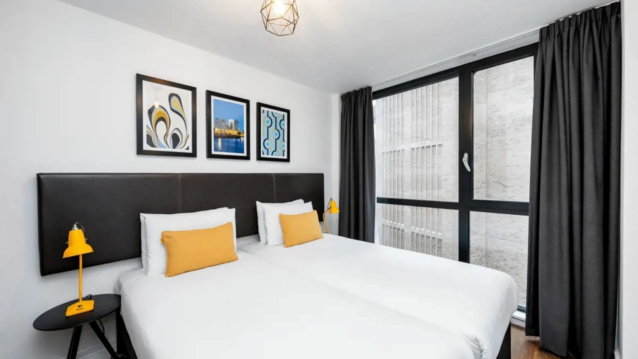Premium bedding, pillowtop beds, desk, blackout drapes