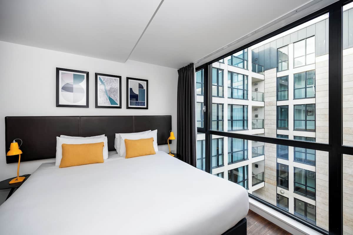 Premium bedding, pillow-top beds, desk, blackout curtains