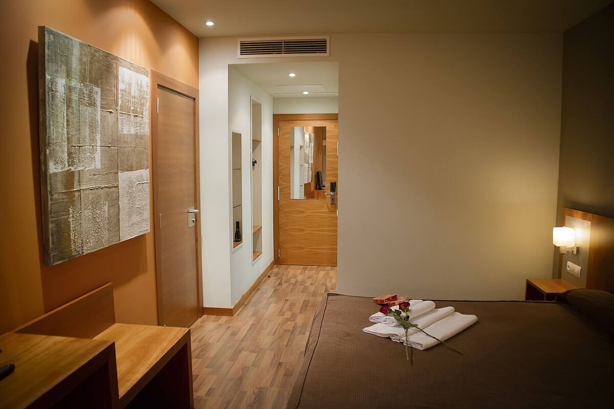 premium bedding, desk, blackout curtains, soundproofing