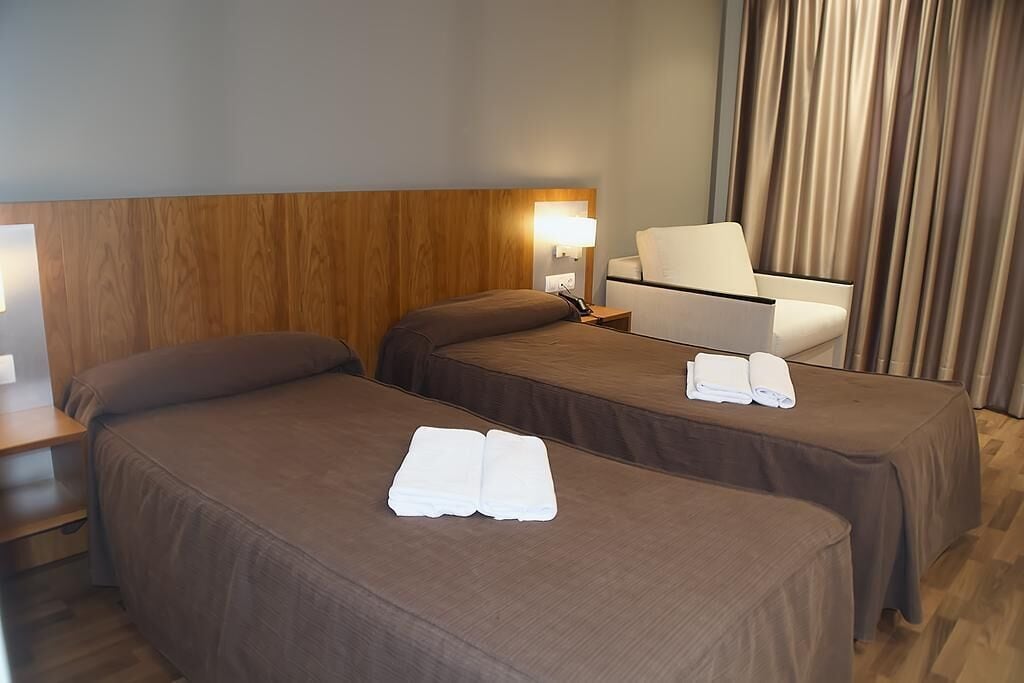 Premium bedding, desk, blackout curtains, soundproofing