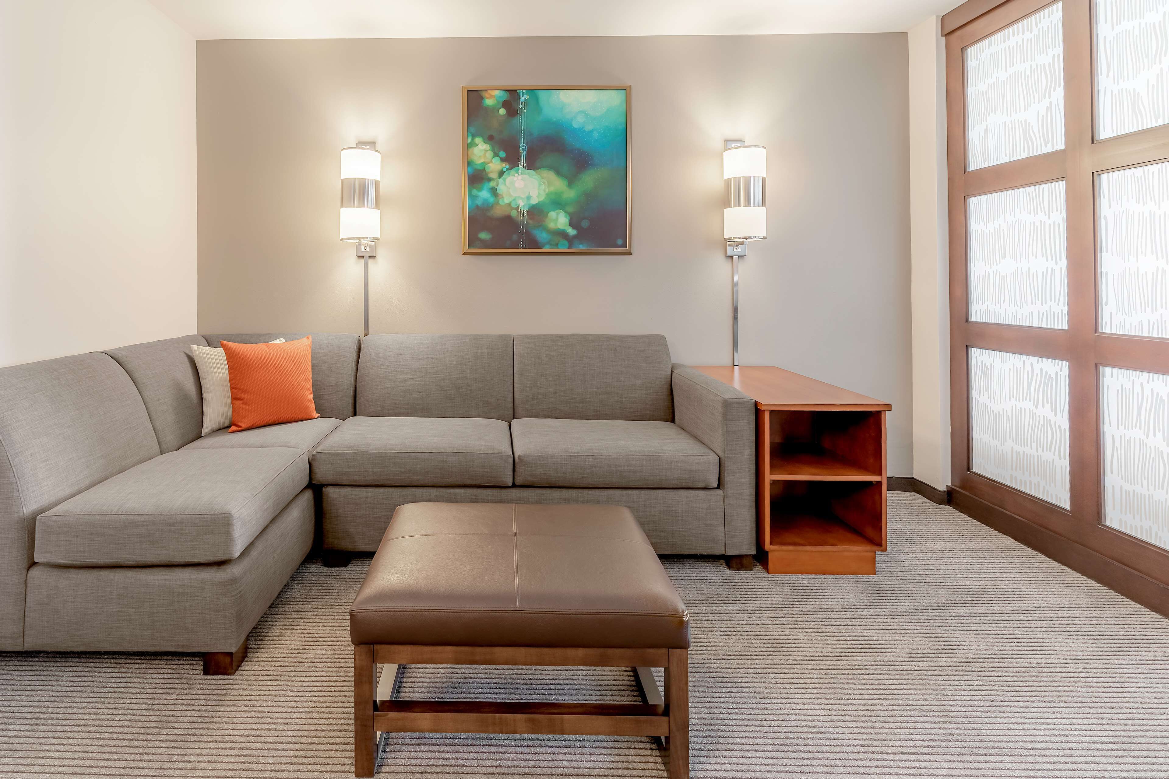 premium bedding, down duvets, memory-foam beds, in-room safe