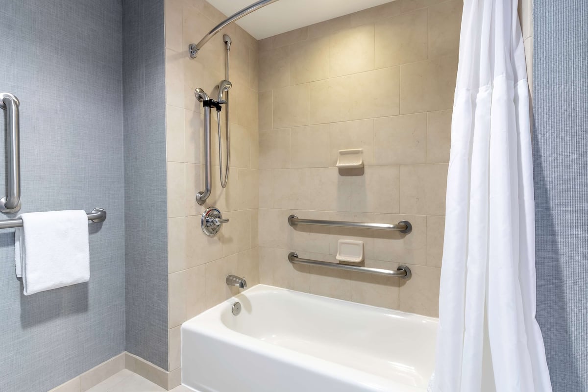 room, 2 queen beds, accessible, bathtub (ada with tub) | bathroom | designer toiletries, hair dryer, towels
