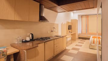 Suite Room | Literie de qualité supérieure, coffres-forts dans les chambres, bureau