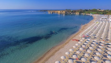 Private beach, sun loungers, beach umbrellas, beach towels