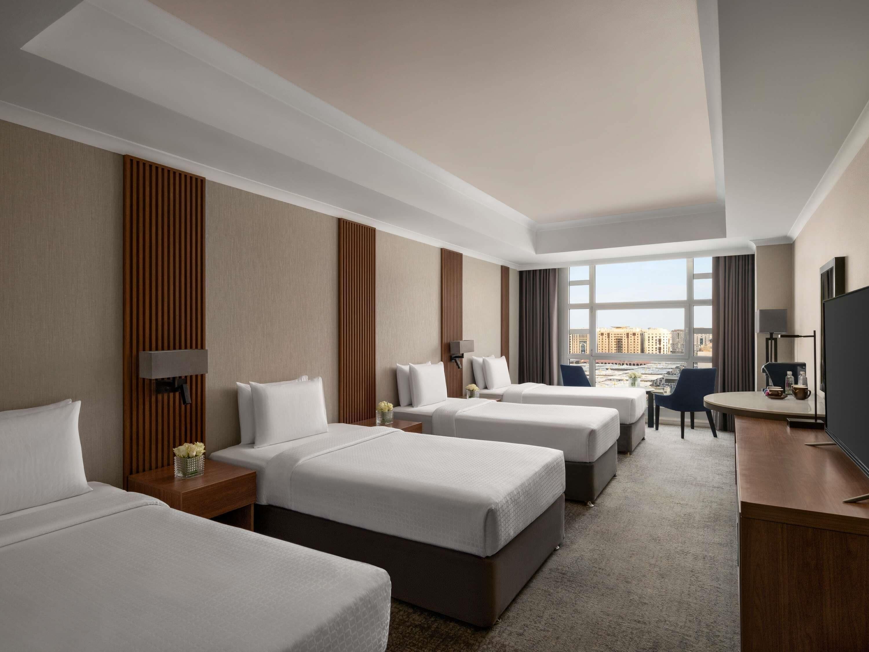 Superior Room, Multiple Beds (Partial Haram View) | Premium bedding, minibar, in-room safe, individually decorated
