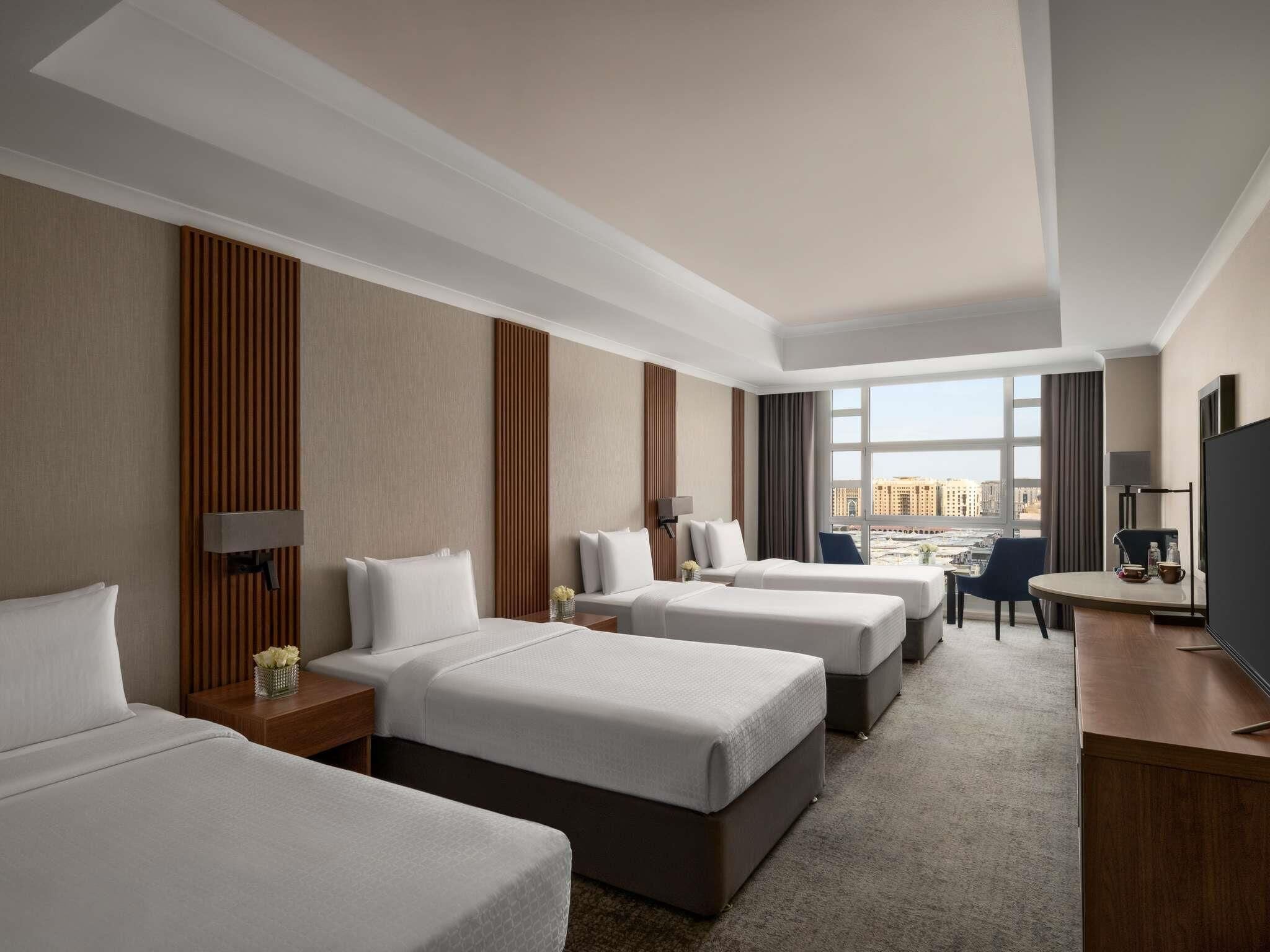 Superior Room, Multiple Beds (Partial Haram View) | Premium bedding, minibar, in-room safe, desk