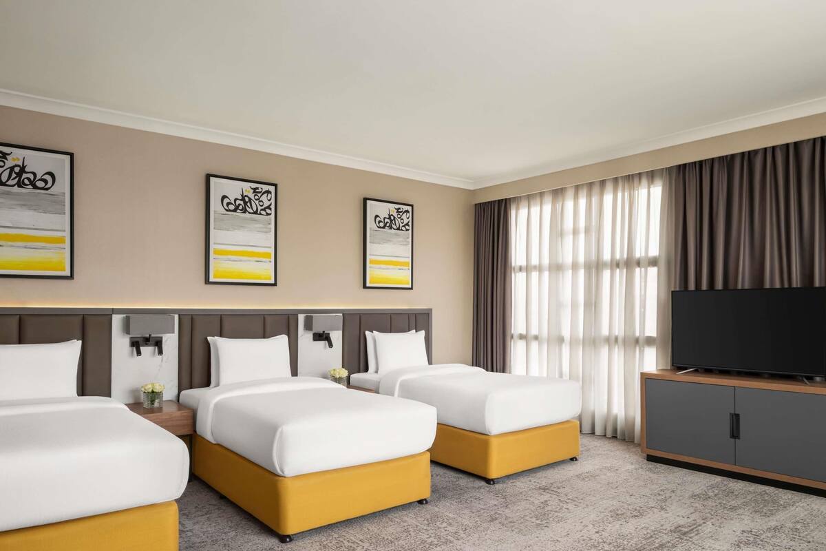 Phòng phong cách cổ điển, 3 giường đơn | Bộ đồ giường cao cấp, minibar, két bảo mật tại phòng, bàn