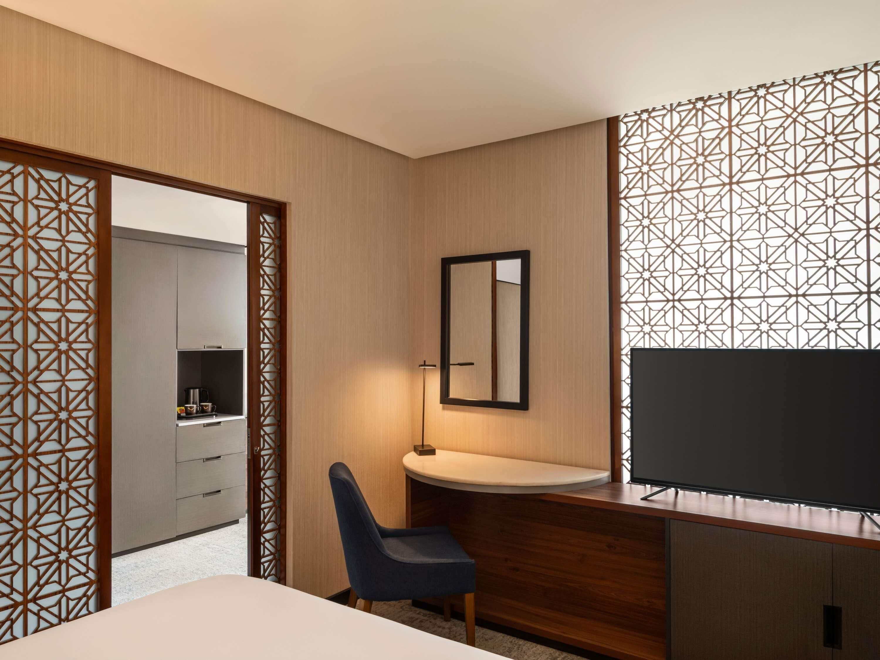 Junior Suite, 1 King Bed | Premium bedding, minibar, in-room safe, individually decorated
