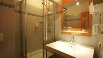 Shower, free toiletries, hair dryer