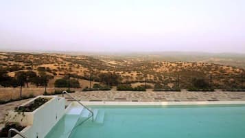 Seasonal outdoor pool, pool umbrellas, sun loungers