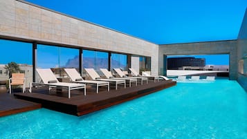 Outdoor pool, sun loungers