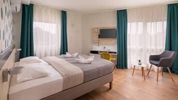 Habitación Deluxe | Caja de seguridad en la habitación y escritorio