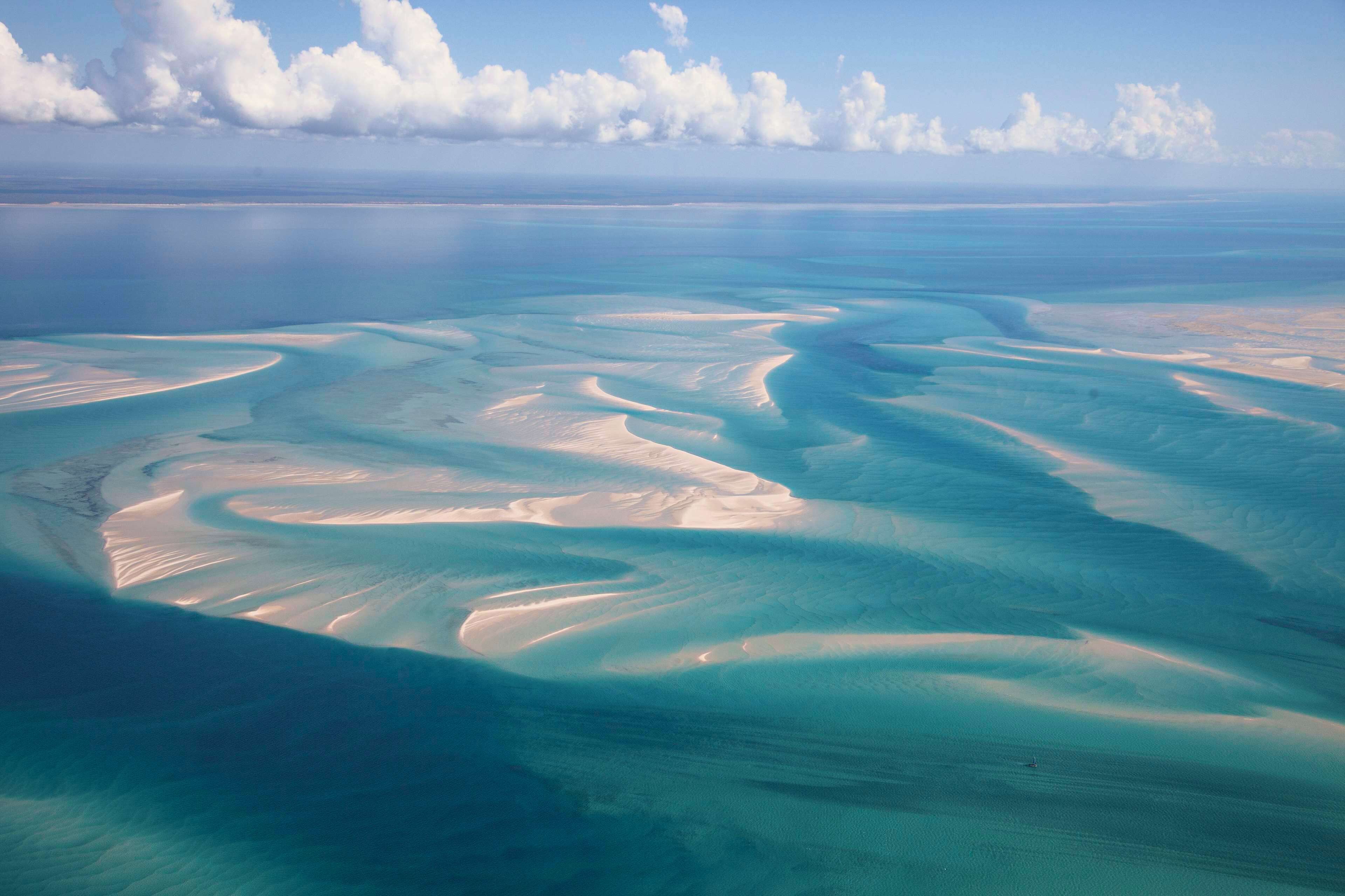 private beach, white sand, free beach cabanas, sun-loungers