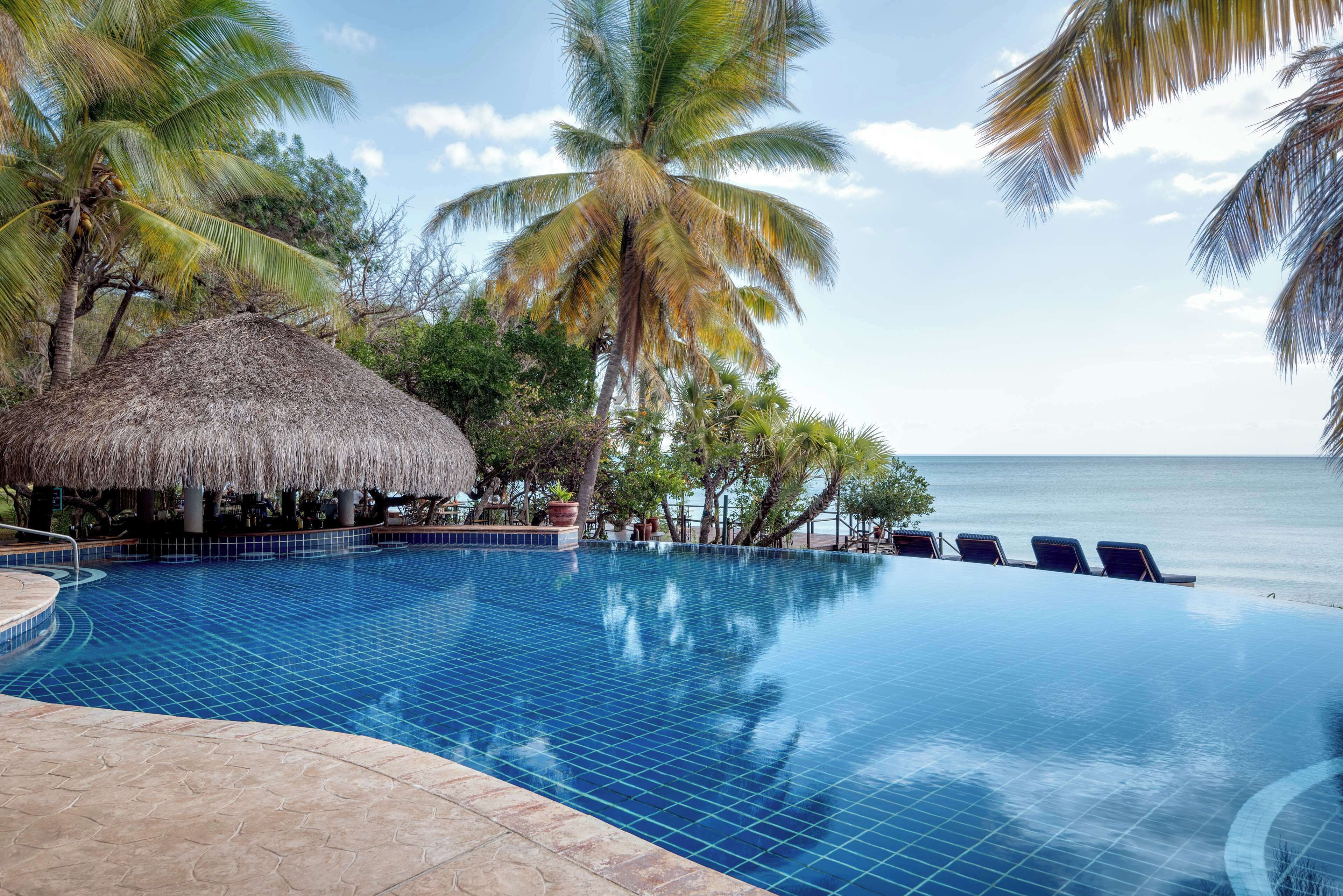 2 outdoor pools, free pool cabanas, pool umbrellas