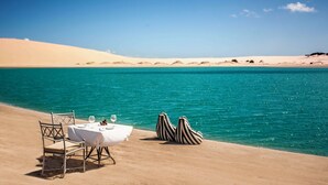 Private beach, white sand, free beach cabanas, sun loungers