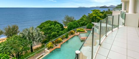 Outdoor pool, pool umbrellas, sun loungers