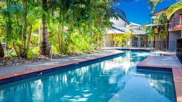 4 outdoor pools, a heated pool, pool loungers