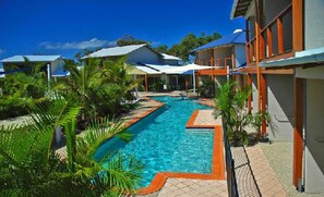 4 outdoor pools, a heated pool, pool loungers