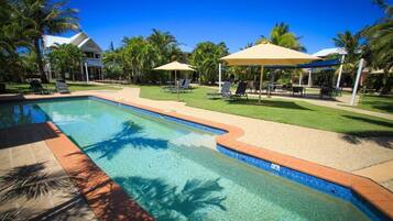 4 outdoor pools, a heated pool, pool loungers