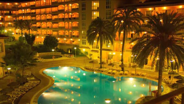 Seasonal outdoor pool, pool umbrellas, pool loungers